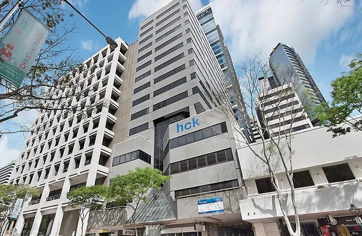 HCK Sells 116 Adelaide Street Office Tower at Loss